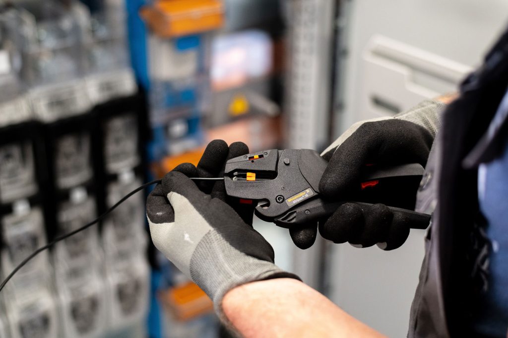 closeup-shot-of-an-electrician-in-gloves-repairing-2023-11-27-05-07-31-utc2.jpg
